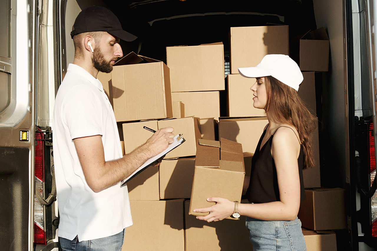 A small business team reviewing packages ready for dispatch