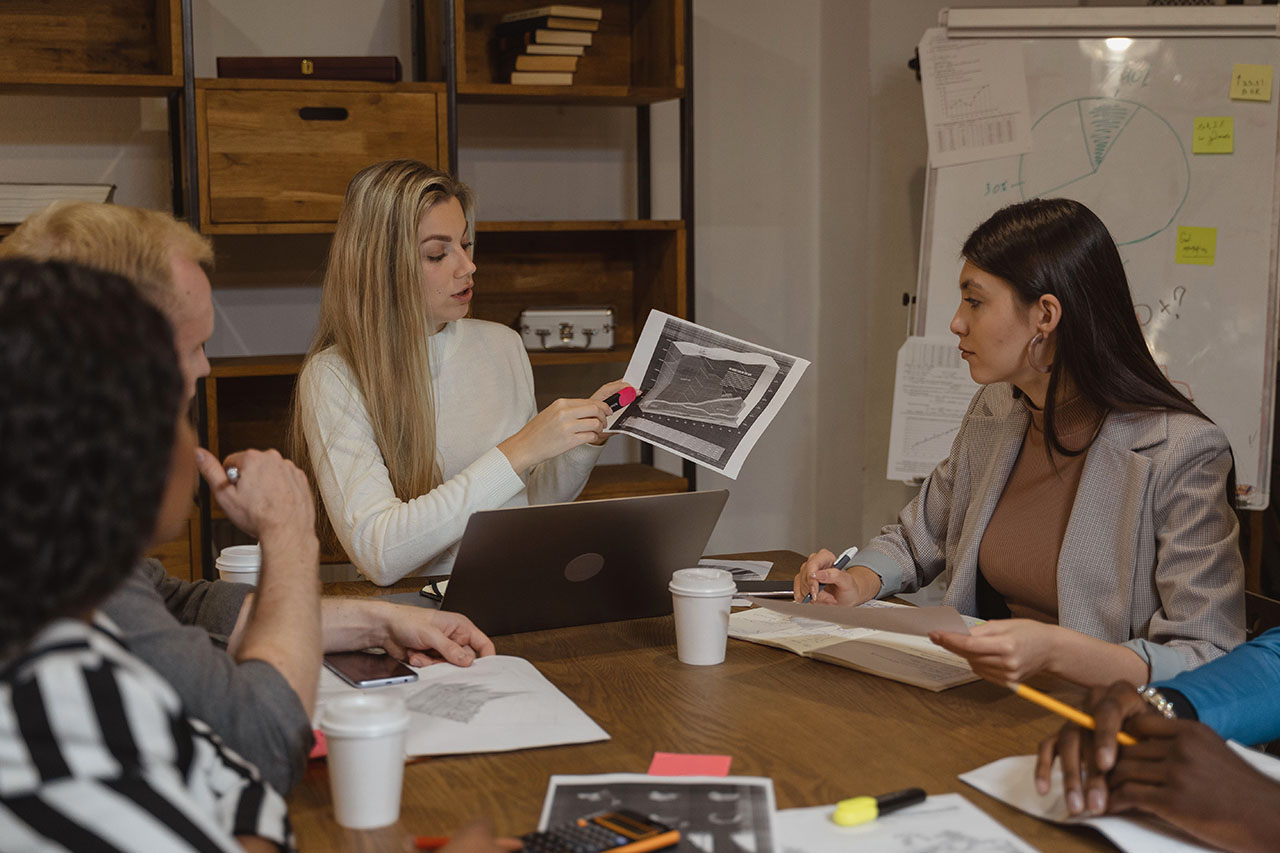 A small business team planning client work together